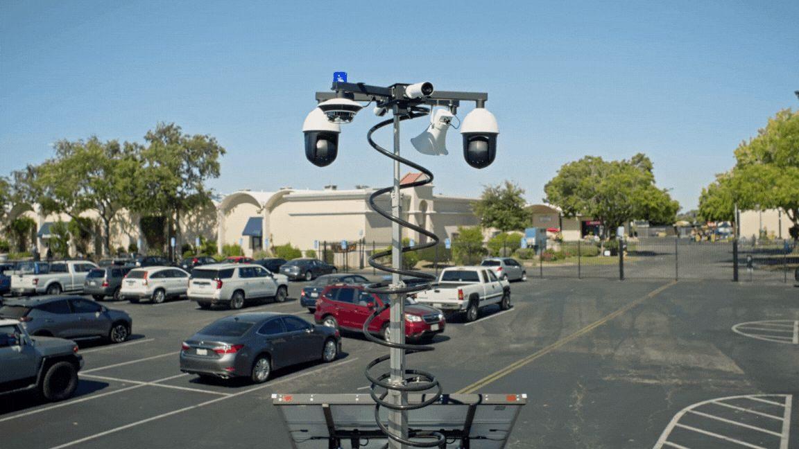 Verkada MT81 mobile security trailer covering an open site perimeter in daylight